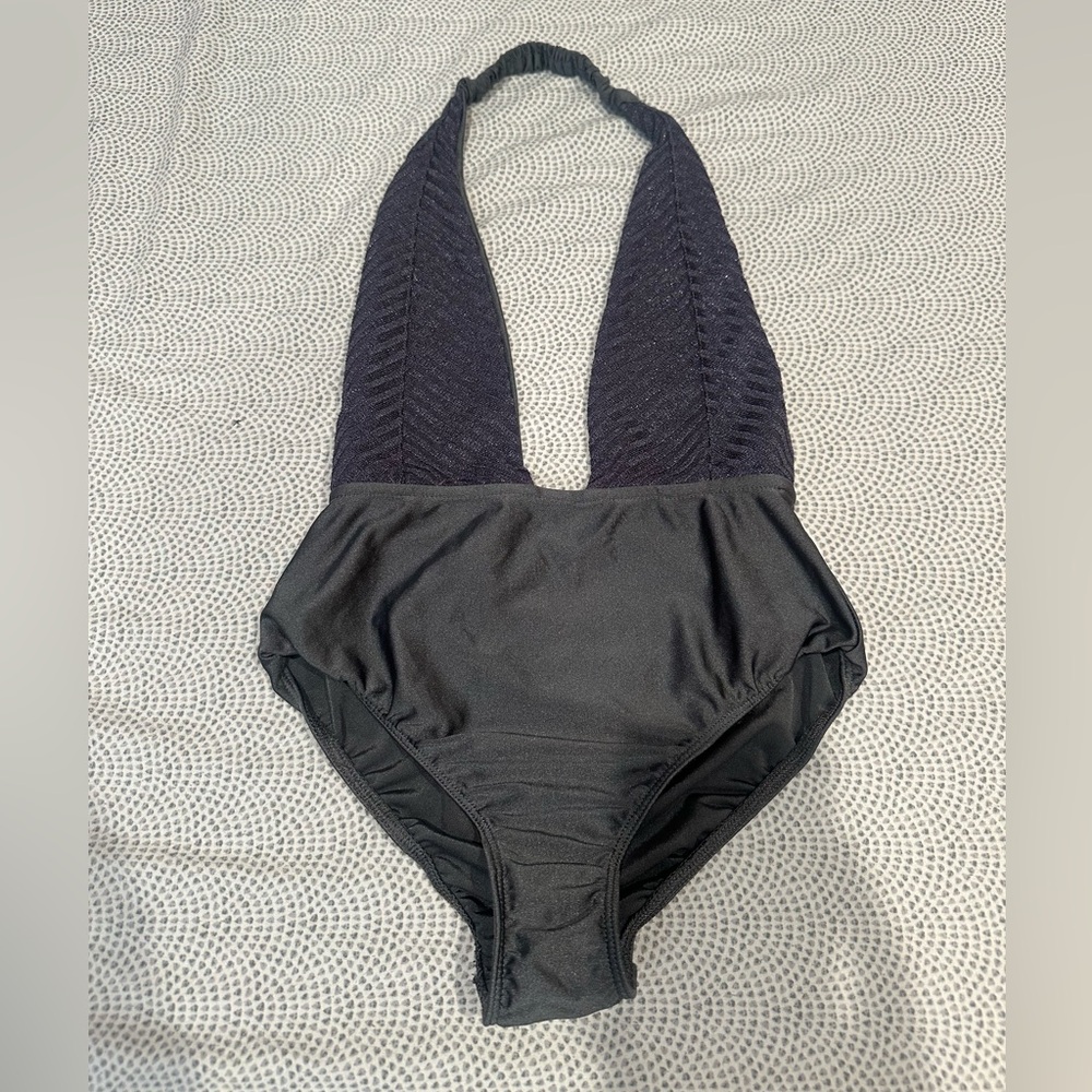 Out from under body suit